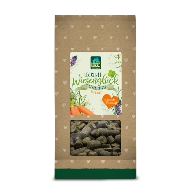 LEXA Wiesen Glück Tierleckerlis Packung mit Leckerlis für Tiere, Marke LEXA, mit einer transparenten Sichtfenster und einer Mischung aus Kräutern und Karotten.
