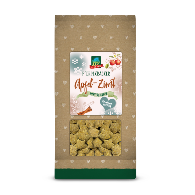 Packung mit LEXA Pferdeleckerlis in Sternform, Geschmacksrichtung Apfel-Zimt, Winteredition. Die braune Tüte zeigt eine Produktabbildung sowie den Aufdruck "PFERDEKRÄCKER Apfel-Zimt"
